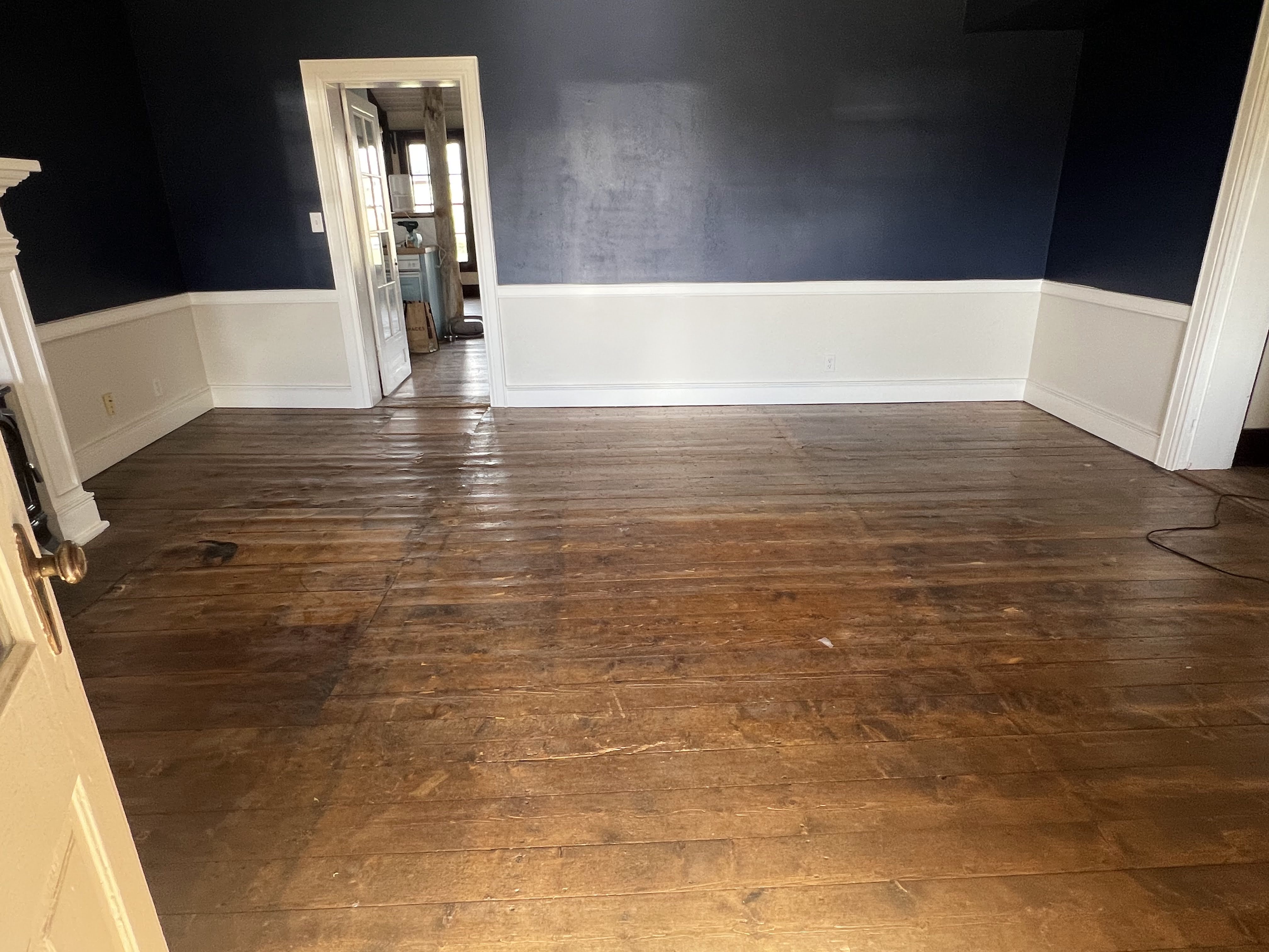 Close view of the original pioneer flooring before removal